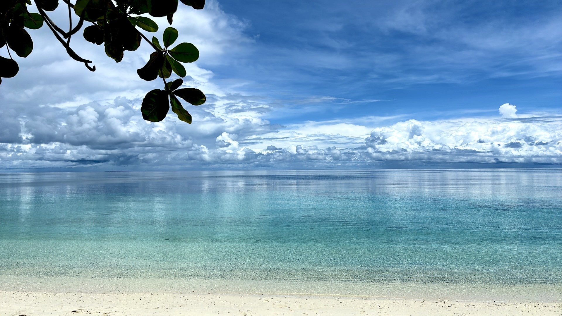 Clear tropical water and a wide blue sky in Indonesia